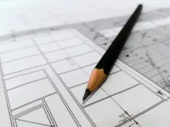 image of a plan and pencil
