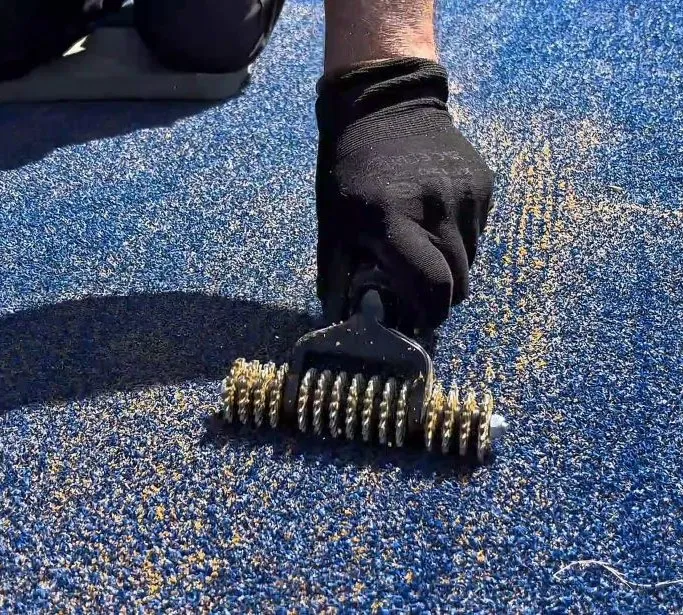 image of working sand into court